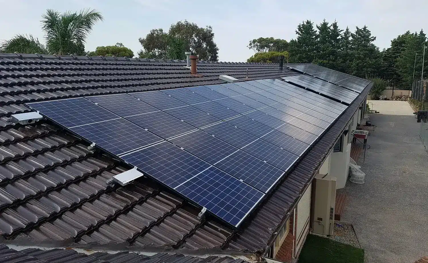 Solar Power Panels Installation done over a roof